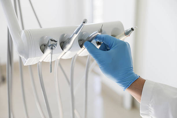 Professional Tooth Extraction technician working in Gleed, WA